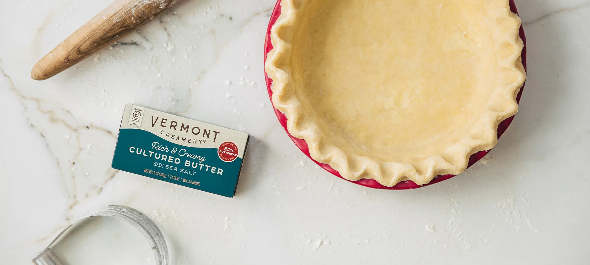 Vermont Creamery Cultured Butter Next to Unbaked Pie Crust